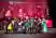 People on a stage in cosplay